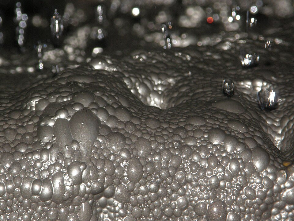 Copper-sulphide mineral froth in a flotation cell at a processing plant.