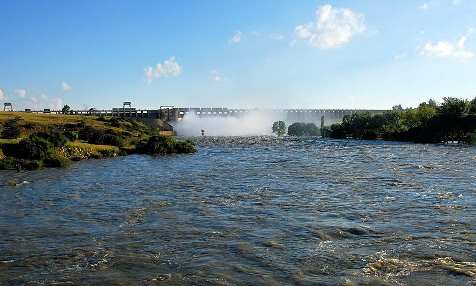 Vaal Dam releasing water through open sluice gates in South Africa.