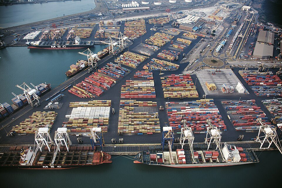 Container ships, cranes and cargo stacks at Durban's container port.