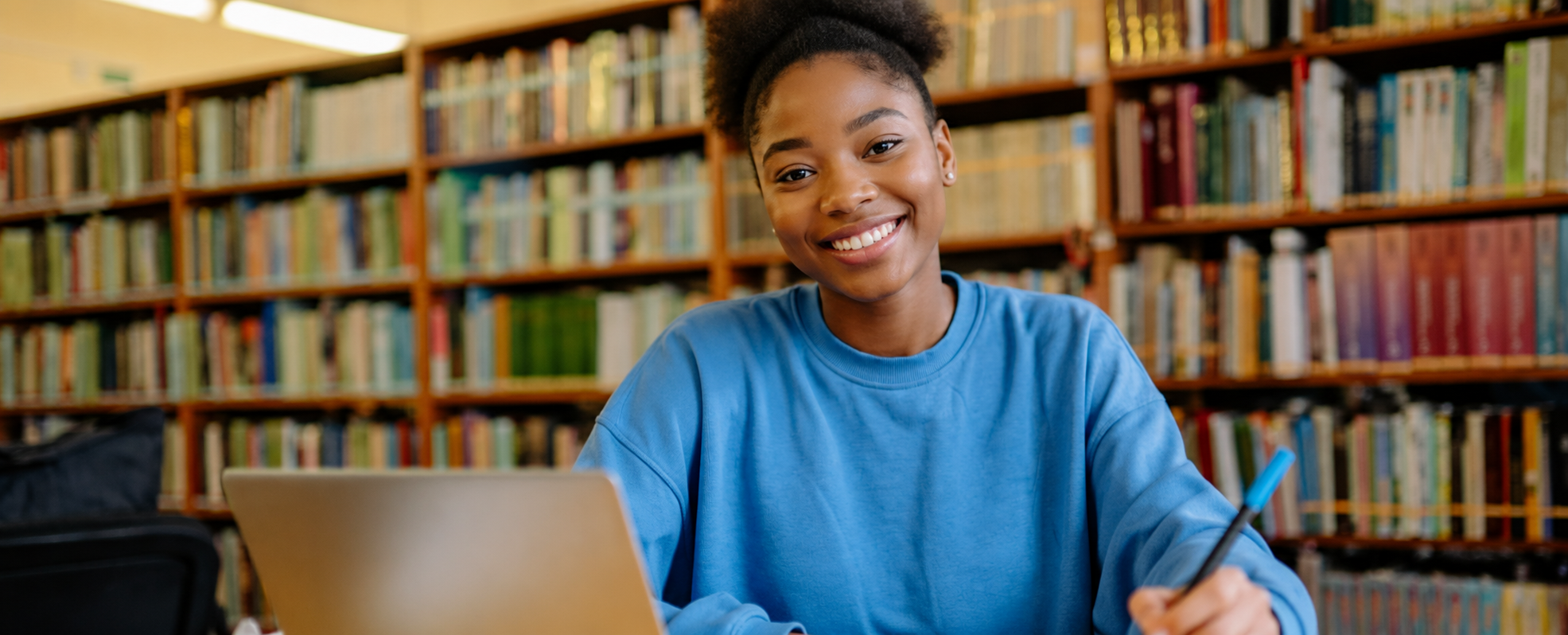 Student studying in a library